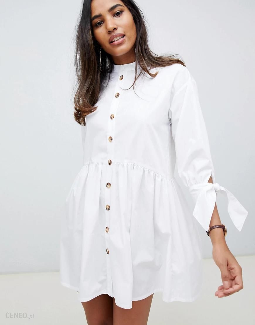 ASOS DESIGN – Biała sukienka mini o luźnym kroju zapinana na guziki, ze  stójką i wiązanymi rękawami-Biały - Ceny i opinie 