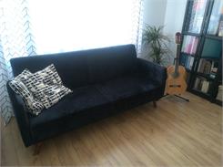 Beliani Sofa rozkładana welurowa 3-osobowa z funkcją spania retro czarna Senja