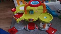 Smoby Little Mój Pierwszy Garaż Samochodzik Vroom Planet